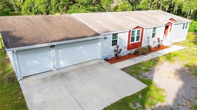 Enjoy the ease of an oversized three-car attached garage with direct home access.