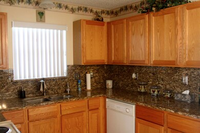 Kitchen w/Granite Back Splash