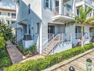 Entrance to property with stucco siding