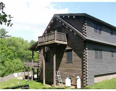 Exterior Back. Master Bedroom Balcony