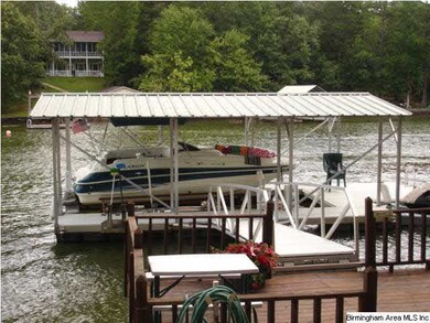 aluminum dock with boat lift and jet ski port, als