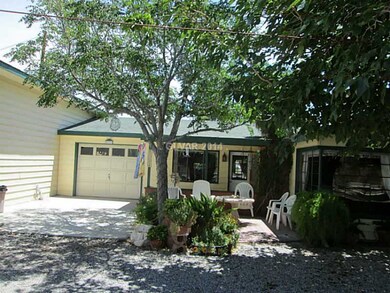 Facade/Exterior Front. Front patio for entertainin