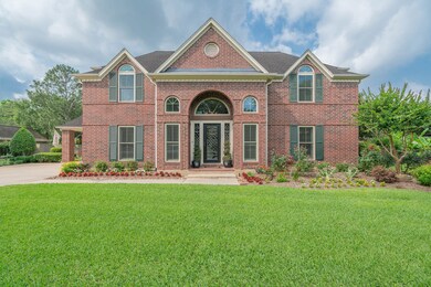 Welcome to 206 Pine Willow Court!  This custom-built Samson Builders two story 5 bedroom home showcases a traditional red brick elevation with charming wood shutters and is surrounded by a beautifully landscaped yard with plenty of parking along the extended driveway with port cochere.