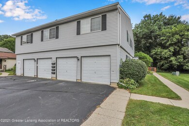 3928 Hunters Ridge Dr unit 1, Lansing, MI 48911 - photo 2