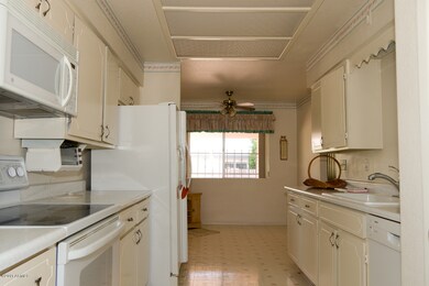 Galley kitchen, newer appliances.