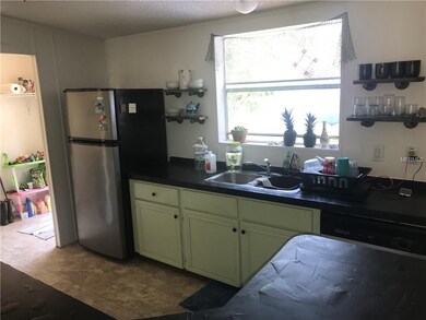 KITCHEN AREA INTO LAUNDRY ROOM