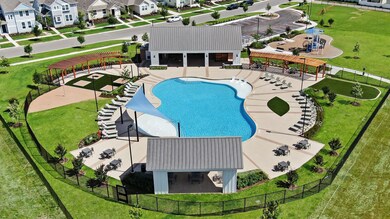 Community pool featuring a residential view