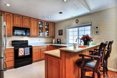 Enjoy a meal in the dining area, at the kitchen co