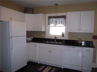 Kitchen. The New Kitchen Features New White Cabine