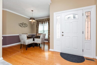 Formal Dining area open to living room and entry. Make it as large or small as you need.