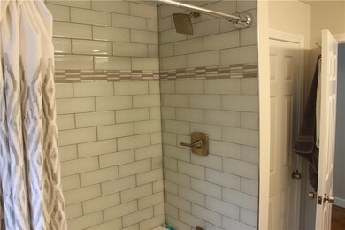 BEAUTIFULLY TILED SHOWER & TUB