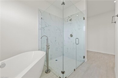 Bathroom with separate shower and tub