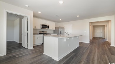 Kitchen featuring stainless steel appliances, a ki