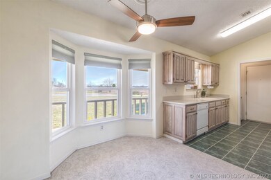 View of dining and kitchen spaces