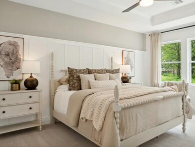 Primary suite with decorated feature wall