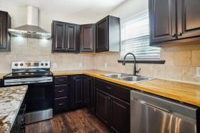 Kitchen featuring appliances with stainless steel 
