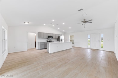 Kitchen featuring appliances with stainless steel