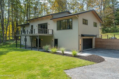 REAR ELEVATION WITH DECK AND GARAGE