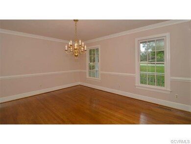 Formal Dining Room with Crown Moulding, Hardwood F