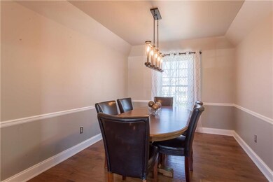 Enjoy entertaining in light comfortable dining roo