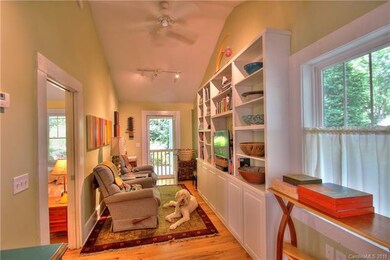 Cozy, comfortable den with built-ins.
