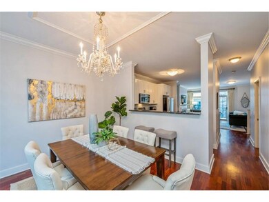Dining room with breakfast bar and kitchen.