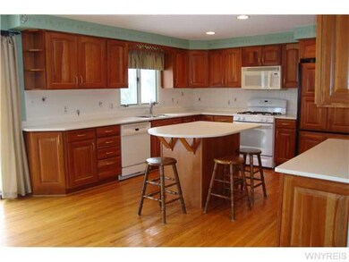 Kitchen. Gorgeous Cherry cupboards. Built-ion refr