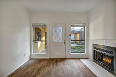 Doorway to outside featuring wood finished floors