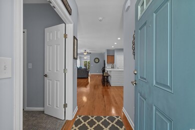 Foyer featuring baseboards, recessed lighting, lig