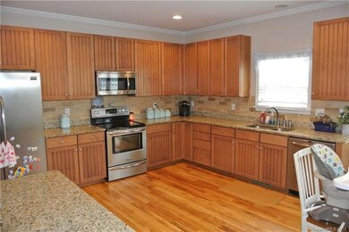 Huge kitchen with gorgeous granite & stainless