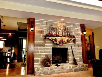 The interiors are open concept with beautiful hand crafted trayed ceilings with custom lighting! Notice the detail. Whoever is lucky enough to buy this home will be the envy of your friends and family!