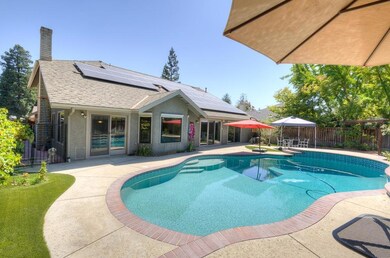 Owned solar system and a salt water pool.