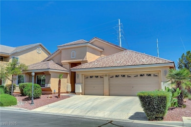 View of front facade featuring stucco siding, driv