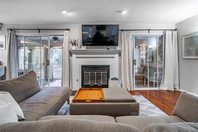 Gas fireplace with glass doors and surround with m