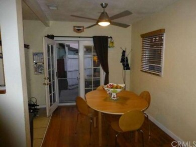 Dining area with French doors leading to backyard