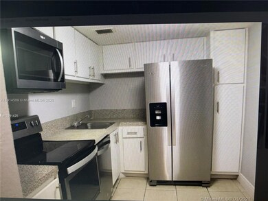 Bayview Palms unit 320, North Miami, FL 33181 - photo 2