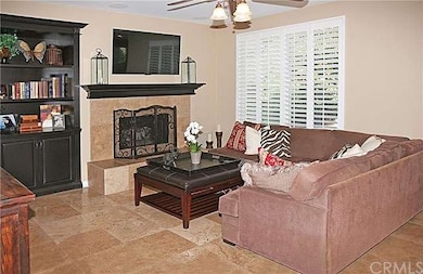 Cozy Family Room off the Kitchen Features Surround