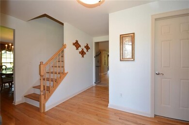 Spacious, bright and light entry with gleaming har