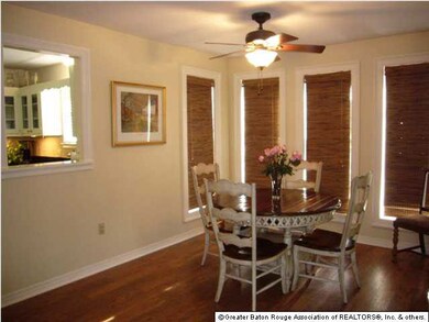 Breakfast area has wood floors, too