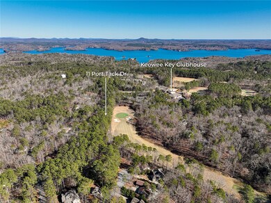 drone view shows proximity to lake and clubhouse