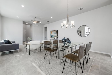 Dining room with recessed lighting, visible vents