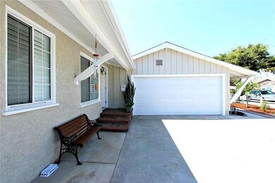 Front yard with additional parking area