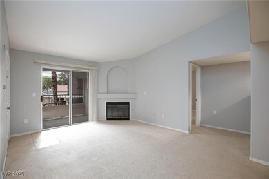 Unfurnished living room featuring carpet flooring