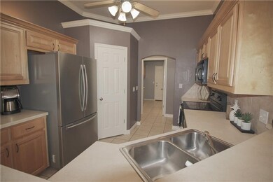 Kitchen with breakfast bar and walk-in pantry