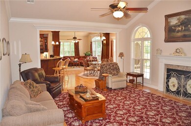 Large living room on main floor leads into informal dining area and second living area right off the kitchen.
