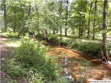 The property borders a creek. The creek is not on 