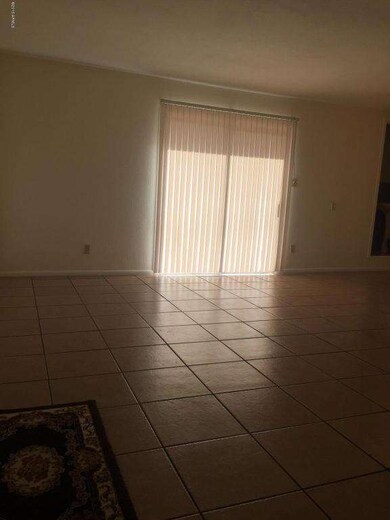 Sliding glass door to enclosed backyard