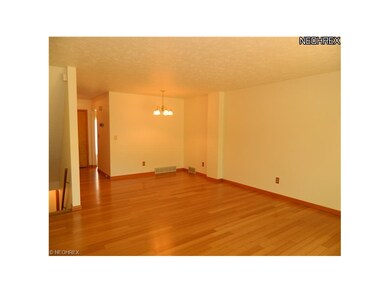 Large family room with beautiful real hard wood fl