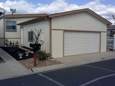 Huge detached garage, with 2 windows, 2 doors and 
