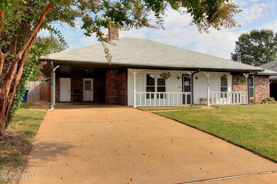 Front with Carport